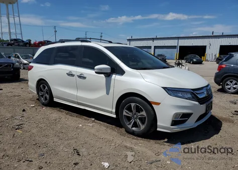 2018 Honda Odyssey Touring from USA, damaged, VIN 5FNRL6H8XJB003650